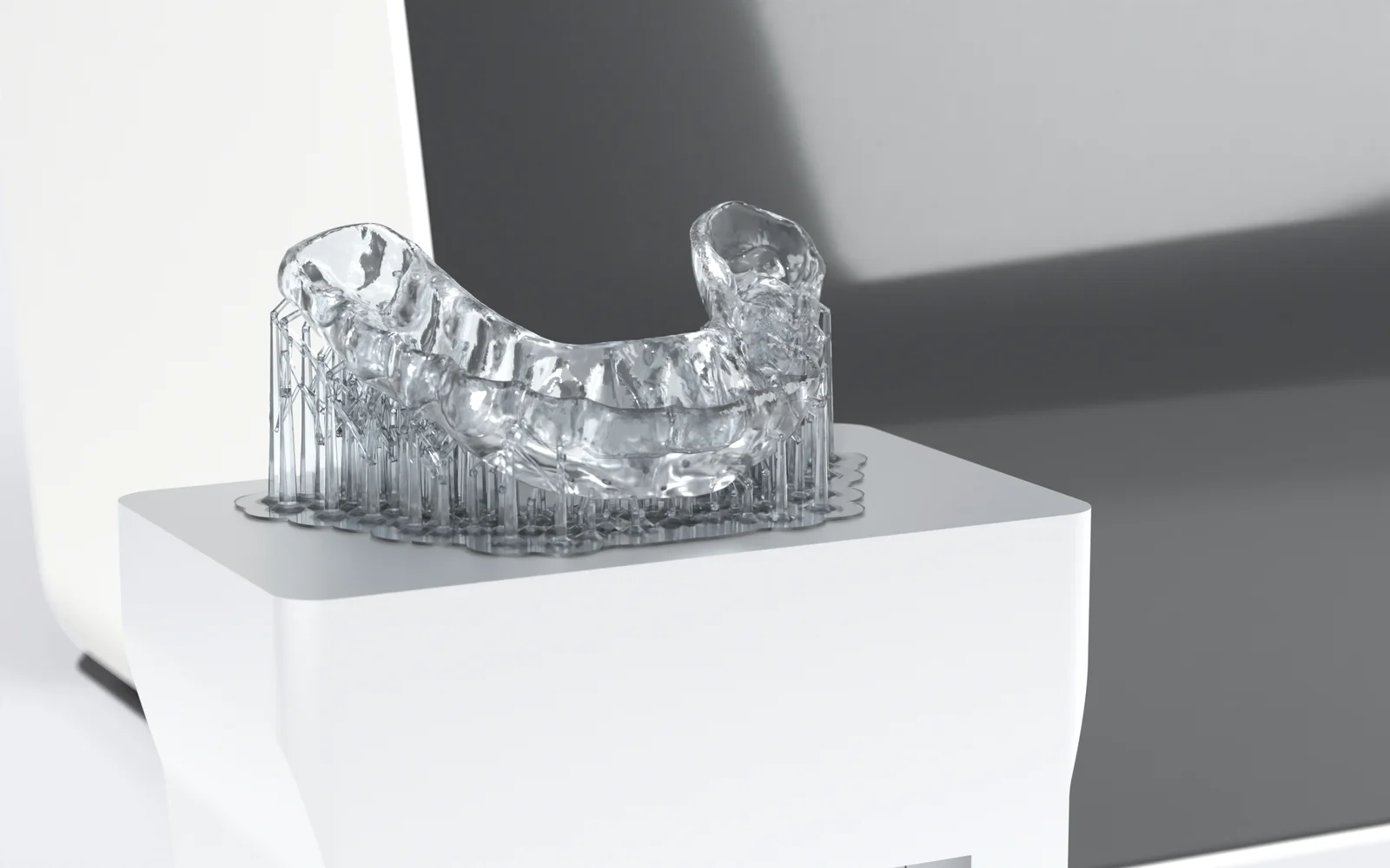 Microlay Ivy con su bandeja de impresión y una férula transparente con sus soportes